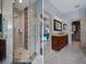 Modern bathroom with a glass-enclosed shower and stylish vanity, offering a spa-like experience in your home at 15630 N Himes Ave, Tampa, FL 33618