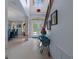 Bright foyer features a staircase, high ceilings, tile flooring, and a dining room at 15630 N Himes Ave, Tampa, FL 33618