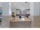Open kitchen design showcasing granite countertops, stainless steel appliances, and a functional breakfast bar at 15630 N Himes Ave, Tampa, FL 33618