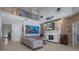 Spacious living room with high ceilings, fireplace, and ample natural light at 15630 N Himes Ave, Tampa, FL 33618