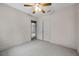 This is a picture of an empty bedroom with a ceiling fan at 1665 Laura St, Clearwater, FL 33755