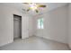 This bedroom has a closet and a window at 1665 Laura St, Clearwater, FL 33755