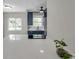 Modern kitchen with quartz countertops, sink view, and stainless steel appliances at 1665 Laura St, Clearwater, FL 33755