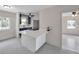 Open concept kitchen with quartz countertops and an adjacent dining area at 1665 Laura St, Clearwater, FL 33755