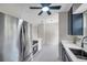Well-equipped kitchen with quartz countertops and stainless steel appliances at 1665 Laura St, Clearwater, FL 33755