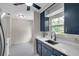 Bright kitchen with a view, modern appliances, and quartz countertops at 1665 Laura St, Clearwater, FL 33755