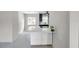 Bright kitchen with quartz countertops and view to the the kitchen sink at 1665 Laura St, Clearwater, FL 33755