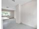 Bright living room with a large window and white trim at 1665 Laura St, Clearwater, FL 33755