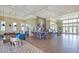 Resident cafe featuring modern decor, counter seating and relaxing seating areas at 16930 Red Brick Ln, Land O Lakes, FL 34638
