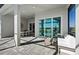 Covered patio overlooking pool area, featuring outdoor seating and dining space at 17030 Moonflower Dr, Venice, FL 34293
