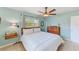Comfortable bedroom with a modern ceiling fan and neutral decor at 1859 Northview Rd, Largo, FL 33770