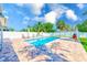 Enjoy the refreshing pool with a spacious patio and lush landscaping, perfect for relaxing at 1859 Northview Rd, Largo, FL 33770