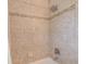 Close-up of the tiled shower featuring a modern shower head at 1859 Northview Rd, Largo, FL 33770