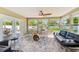 Spacious sunroom with a view of the pool and backyard at 1859 Northview Rd, Largo, FL 33770
