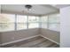 Inviting sun room with abundant windows providing natural light and a view of the surrounding neighborhood at 1914 53Rd S St, Gulfport, FL 33707
