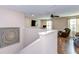 Comfortable loft area with hardwood floors, a ceiling fan, and plenty of natural light at 19533 Whispering Brook Dr, Tampa, FL 33647