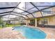 Inviting screened-in pool area with outdoor seating and dining at 19533 Whispering Brook Dr, Tampa, FL 33647