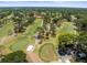 Breathtaking aerial view of the lush golf course and fairways, perfect for golf enthusiasts at 2212 Lark W Cir # E, Palm Harbor, FL 34684