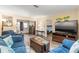 Cozy living room with comfortable seating and modern decor at 2212 Lark W Cir # E, Palm Harbor, FL 34684