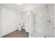 Neutral bathroom featuring new floors, toilet, vanity, and glass shower at 2288 Cheryl Rd, Largo, FL 33771