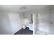 Nicely renovated bathroom featuring gray floors, updated vanity, and tiled walk-in shower at 2288 Cheryl Rd, Largo, FL 33771