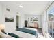 Bedroom featuring natural light, wood-look floors, and neutral decor at 2288 Cheryl Rd, Largo, FL 33771
