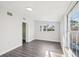 Clean, bright bedroom with gray laminate flooring, white trim and neutral walls create a cozy space at 2288 Cheryl Rd, Largo, FL 33771