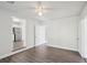 Bedroom view to kitchen features modern colors and wood-look flooring at 2288 Cheryl Rd, Largo, FL 33771