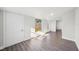 Bright bedroom with stylish gray laminate flooring and updated windows allowing for great natural light at 2288 Cheryl Rd, Largo, FL 33771