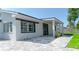 Charming home featuring small rocks, with gray brick driveway and a light gray exterior paint at 2288 Cheryl Rd, Largo, FL 33771