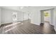 An airy living space showcasing the continuity of flooring and neutral walls at 2288 Cheryl Rd, Largo, FL 33771