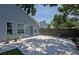 Charming back patio, with brick pavers, perfect for relaxing and entertaining at 2486 Hickman Cir, Clearwater, FL 33761