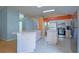 Updated kitchen with stainless steel refrigerator, sleek white cabinets, and modern appliances at 2486 Hickman Cir, Clearwater, FL 33761