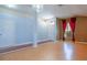 Spacious open living room with wood floors and an entrance with great natural light at 2486 Hickman Cir, Clearwater, FL 33761