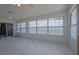 Sunroom offers tiled flooring and multiple windows at 2486 Hickman Cir, Clearwater, FL 33761