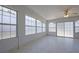 Sunroom with tile flooring and multiple windows at 2486 Hickman Cir, Clearwater, FL 33761