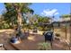 The backyard deck offers a relaxing retreat surrounded by lush greenery at 2932 Chelsea Woods Dr, Valrico, FL 33596