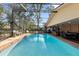 Sparkling pool with patio and enclosure, perfect for outdoor enjoyment at 2932 Chelsea Woods Dr, Valrico, FL 33596
