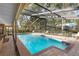 Gorgeous screened-in pool and patio area perfect for entertaining and relaxing at 2932 Chelsea Woods Dr, Valrico, FL 33596
