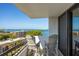 Waterfront balcony view showcases seating and sliding glass doors at 30 Turner St # 604, Clearwater, FL 33756