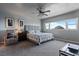 Spacious bedroom featuring a large window offering beautiful views, with a sitting area at 30 Turner St # 604, Clearwater, FL 33756