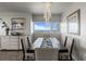 Dining room with contemporary decor and a water view from the window at 30 Turner St # 604, Clearwater, FL 33756