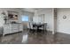 Light and bright dining room featuring marble floors, modern furniture, and a decorative chandelier at 30 Turner St # 604, Clearwater, FL 33756