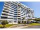 Spacious condo building featuring a porte cochere and multiple private balconies at 30 Turner St # 604, Clearwater, FL 33756