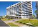Luxury condominium with numerous balconies, porte-cochere, and well-maintained landscaping at 30 Turner St # 604, Clearwater, FL 33756