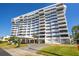Expansive condo building boasting a covered entrance and numerous private balconies at 30 Turner St # 604, Clearwater, FL 33756