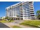 Luxury condominium with numerous balconies, porte-cochere, and well-maintained landscaping at 30 Turner St # 604, Clearwater, FL 33756