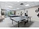 Recreation room with ping pong table, pool table, and a comfortable seating area at 30 Turner St # 604, Clearwater, FL 33756