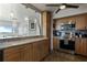 Well-lit kitchen featuring stainless steel appliances, light wood cabinets, and marble countertops at 30 Turner St # 604, Clearwater, FL 33756