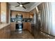 Modern kitchen featuring stainless steel appliances, light wood cabinets, and marble countertops at 30 Turner St # 604, Clearwater, FL 33756